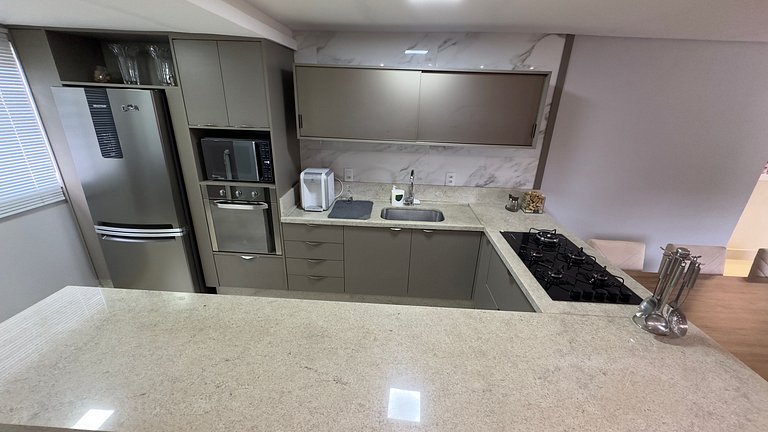 Casa com área Gourmet e confortável