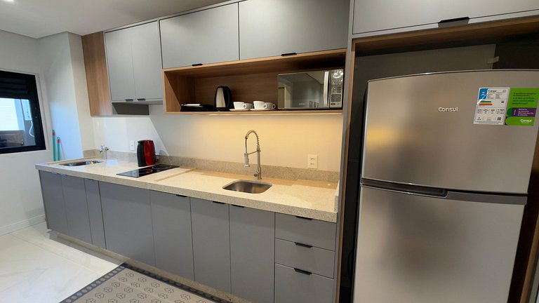 Apartamento novo ao lado do shopping, no centro