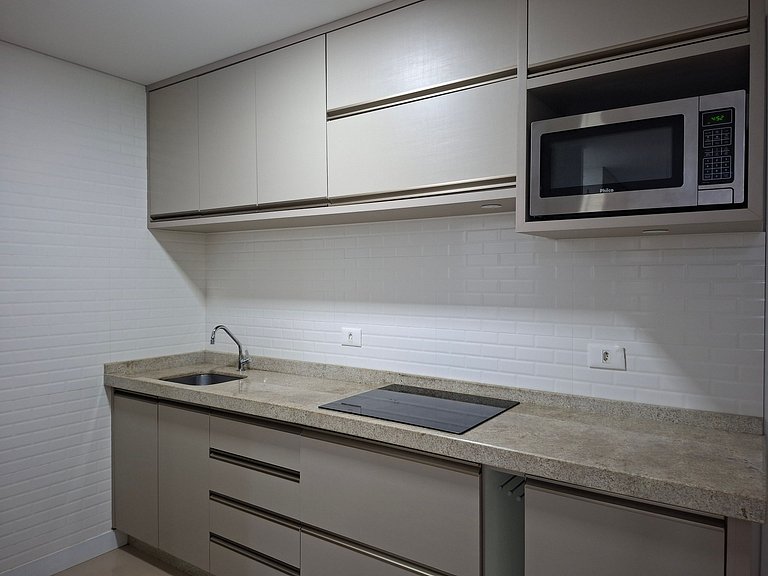 Studio Premium 52m² no Centro: Garagem e Piscina
