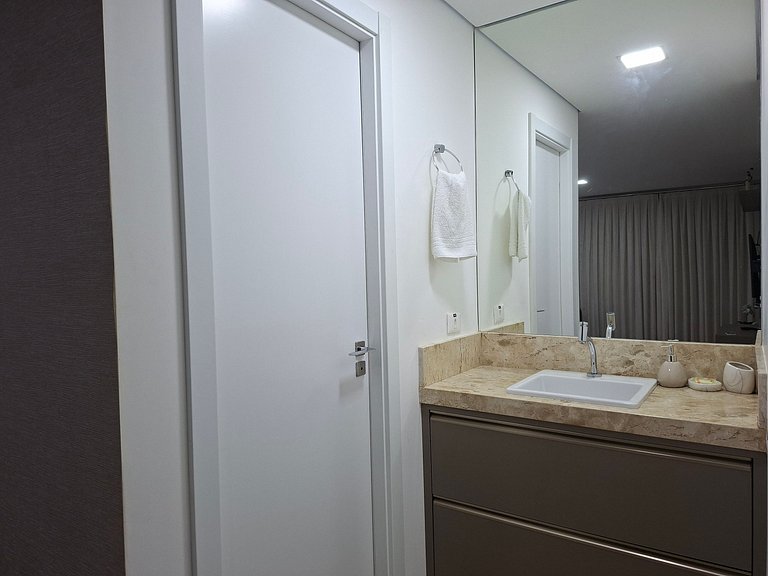 Studio Premium 52m² no Centro: Garagem e Piscina