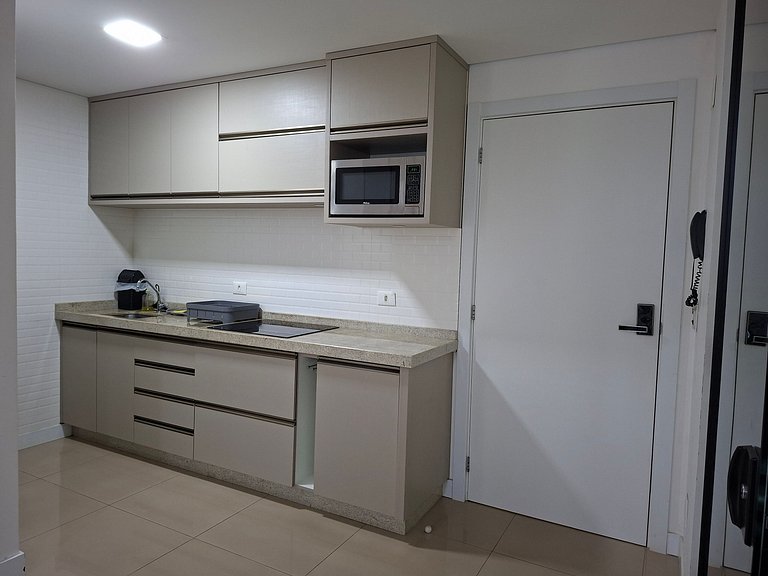 Studio Premium 52m² no Centro: Garagem e Piscina