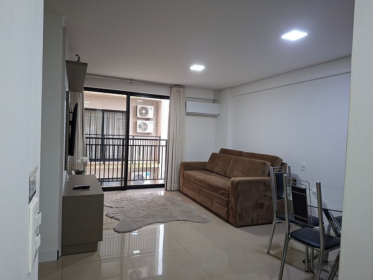 Studio Premium 52m² no Centro: Garagem e Piscina